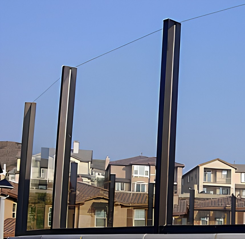 Dark bronze aluminum finish on glass fencing